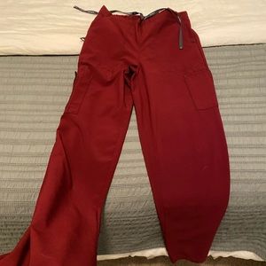 Burgundy Carhartt boot cut scrub pants